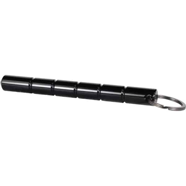 Black Kubotan aluminum self defense keychain lying horizontally.